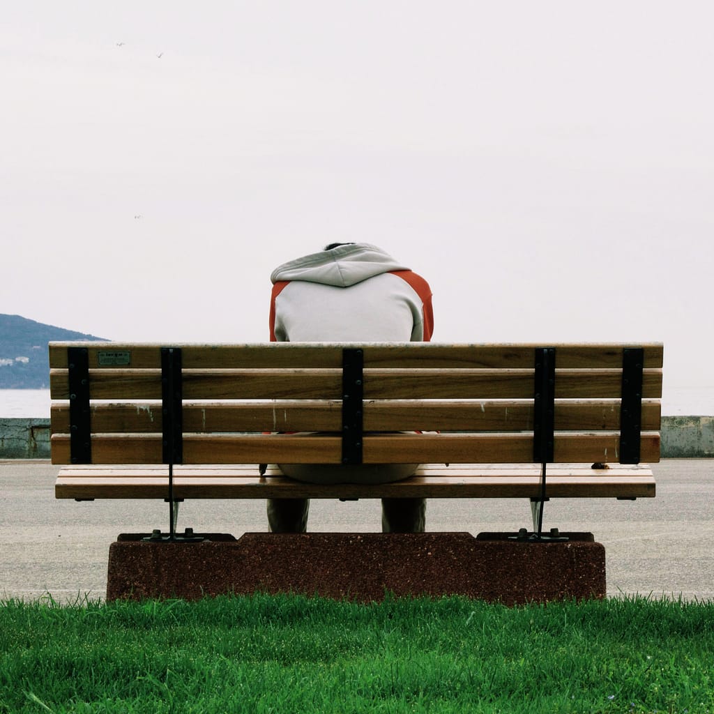 Man on bench depressed